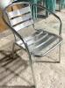 DESCRIPTION: 36" X 36" SOLID METAL PATIO DINGING TABLE W/ (4) ALUMINUM CHAIRS AS SHOWN ADDITIONAL INFORMATION INCLUDES: (4) CHAIRS & TABLE (SOLD AS SE - 4