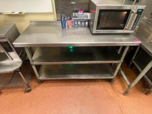 DESCRIPTION: 60" X 24" STAINLESS TABLE (2) LOWER STAINLESS SHELVES. ADDITIONAL INFORMATION CONTENTS ARE NOT INCLUDED. TWO LOWER SHELVES. SIZE 60" X 24