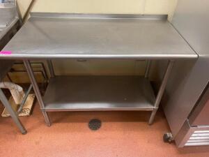 DESCRIPTION: 48" X 24" STAINLESS TABLE W/ 2" BACK SPLASH ADDITIONAL INFORMATION W/ STAINLESS UNDER SHELF SIZE 48" X 24" LOCATION: KITCHEN QTY: 1