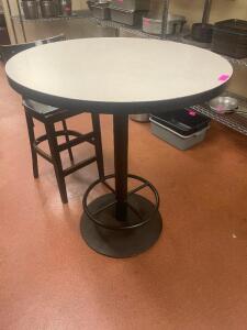 DESCRIPTION: 36" COMPOSITE TOP TABLE W/ HEAVY DUTY PUB BASE AND FOOT RAIL SIZE 36" X 42" T LOCATION: KITCHEN QTY: 1