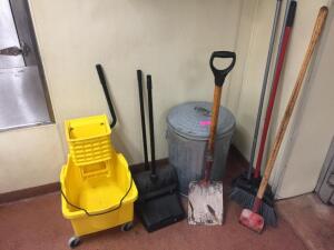 DESCRIPTION: (1) LOT OF CLEANING SUPPLIES MOP BUCKET, BROOMS, DUST PANS, AND TRASH CAN. LOCATION: KITCHEN THIS LOT IS: ONE MONEY QTY: 1