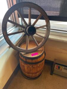 DESCRIPTION: SMALL WOODEN BARREL AND WHEEL. LOCATION: ENTRANCE THIS LOT IS: ONE MONEY QTY: 1