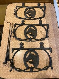 DESCRIPTION: (3) CAST IRON HORSE COAT HANGERS LOCATION: SEATING THIS LOT IS: SOLD BY THE PIECE QTY: 3