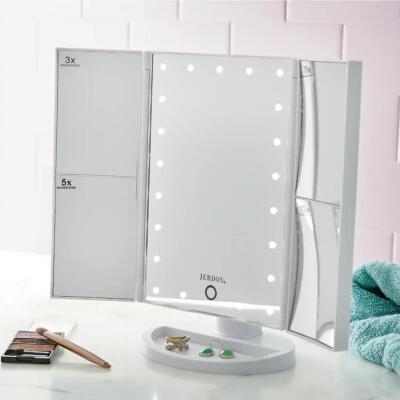 DESCRIPTION Multi-Magnification Lighted Makeup Mirror CONDITION Tested Good - In Box - Retail - $69.99 ADDITIONAL INFO Do your makeup with speed and c