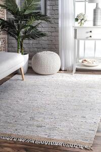 DESCRIPTION: (1) SOLID AREA RUG BRAND/MODEL: NEMA6B INFORMATION: BEIGE RETAIL$: $131.06 SIZE: 7'6" X 9'6" QTY: 1