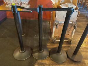 (5) BLACK STANCHION POSTS W/ RETRACTABLE CORDS