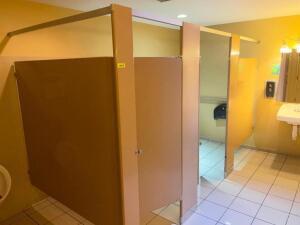 (2) TOILETS AND (1) SET OF METAL STALL PARTITIONS.