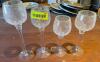 (4) ASSORTED WINE GLASS CENTER PIECES.