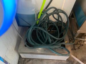 GARDEN HOSE AND CHEMICAL DISPENSER