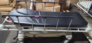 DESCRIPTION: (1) TRANSPORT STRETCHERBRAND/MODEL: STRYKER 721INFORMATION: FIXED HEIGHT, FOLDING SIDE RAILS, 3" MATTRESS, 500LB CAPACITYRETAIL$: $2999SIZE: 83" X 30" X 36"QTY: 1