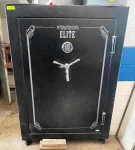 DESCRIPTION: STACK ON ELITE 69 GUN FIREPROOF GUN SAFE. W/ COMBO AND KEY ADDITIONAL INFORMATION A068KD0790281, RETAILS FOR $1700 SIZE 56" X 40" LOCATIO