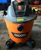 DESCRIPTION: RIDGID HD1200 12 GALLON WET DRY SHOP VAC BRAND / MODEL: RIDGID HD1200 ADDITIONAL INFORMATION HOSE IS INSIDE CANISTER LOCATION: WAREHOUSE