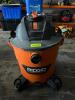 DESCRIPTION: RIDGID HD1200 12 GALLON WET DRY SHOP VAC BRAND / MODEL: RIDGID HD1200 ADDITIONAL INFORMATION HOSE IS INSIDE CANISTER LOCATION: WAREHOUSE - 2