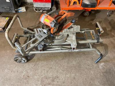 DESCRIPTION: RIDGID .10" DUAL BEVEL SLIDING COMPOUND MITER SAW BRAND / MODEL: RIDGID MS255SR ADDITIONAL INFORMATION W/ PORTABLE STAND LOCATION: PAINT