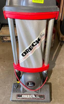 DESCRIPTION: ORECK XL PRO COMMERCIAL VACUUM CLEANER BRAND / MODEL: ORECK XL PRO ADDITIONAL INFORMATION RETAILS FOR $500 LOCATION: PAINT ROOM QTY: 1