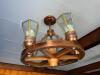 DESCRIPTION: WAGON WHEEL CHANDELIER LIGHT FIXTURE LOCATION: HOUSE QTY: 1