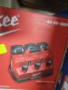 DESCRIPTION: (1) RAPID CHARGE BATTERY STATION BRAND/MODEL: MILWAUKEE #48-59-1807 INFORMATION: RED RETAIL$: $229.00 EA SIZE: M18 AND M12 QTY: 1 - 2