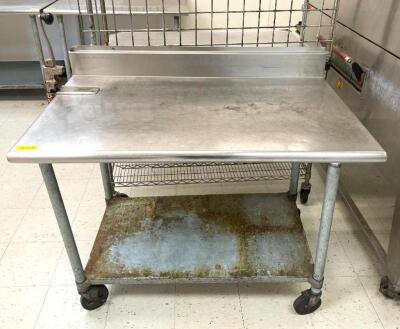 4' STAINLESS STEEL TABLE WITH GALVANIZED UNDERSHELF AND MOUNTED CAN OPENER ON CASTERS