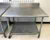 4' STAINLESS STEEL TABLE WITH GALVANIZED UNDERSHELF ON CASTERS