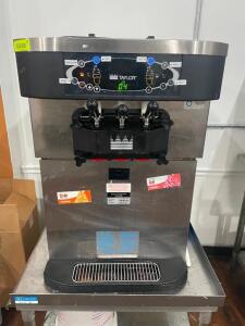 DESCRIPTION: TAYLOR AIR COOLED FROZEN YOGURT MACHINE BRAND / MODEL: CROWN C723-27 ADDITIONAL INFORMATION SN# M1052795, 208-230 VOLT, 1 PHASE. RETAILS