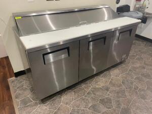 DESCRIPTION: TRUE 72" THREE DOOR PREP TOP COOLER. NEW 2017 BRAND / MODEL: TRUE TSSU-72-18 ADDITIONAL INFORMATION SN# 9077288, 115 VOLT, 1 PHASE. RETAI