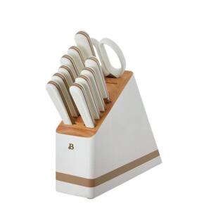 DESCRIPTION: (1) FORGED KITCHEN KNIFE SET BRAND/MODEL: BEAUTIFUL INFORMATION: WHITE WITH WOOD STORAGE BLOCK RETAIL$: $67.00 TOTAL SIZE: 12 PIECE QTY: