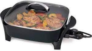 DESCRIPTION: (1) SKILLET WITH GLASS COVER BRAND/MODEL: PRESTO #07117 INFORMATION: BLACK RETAIL$: $34.96 EA SIZE: 12" QTY: 1