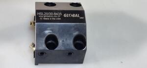 DESCRIPTION: (1) HAAS ID AXIS EXTERNAL COOLANT TOOL BLOCK BRAND/MODEL: GLOBAL HSL20/30-8435 RETAIL$: $454.00 SIZE: 1-1/2" QTY: 1