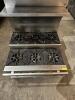 DESCRIPTION: 36" STEP-UP GAS COUNTERTOP RANGE W/ (6) BURNERS SIZE: 36" X 36" QTY: 1 - 6