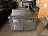 DESCRIPTION: 48" SANDWICH/SALAD PREP TABLE W/ REFRIGERATED BASE ON CASTERS BRAND/MODEL: TRUE TSSU-48-10 INFORMATION: VOLTS: 115 HZ: 60 PHASE: 1 AMPS: - 3