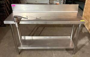DESCRIPTION: 51" X 18" STAINLESS PREP TABLE W/ MOUNTED COMMERCIAL CAN OPENER ON CASTERS INFORMATION: 6" BACKSPLASH SIZE: 51" X 18" X 33" QTY: 1