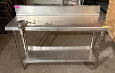 DESCRIPTION: 51" X 18" STAINLESS PREP TABLE W/ MOUNTED COMMERCIAL CAN OPENER ON CASTERS INFORMATION: 6" BACKSPLASH SIZE: 51" X 18" X 33" QTY: 1