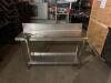 DESCRIPTION: 51" X 18" STAINLESS PREP TABLE W/ MOUNTED COMMERCIAL CAN OPENER ON CASTERS INFORMATION: 6" BACKSPLASH SIZE: 51" X 18" X 33" QTY: 1 - 2