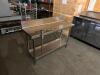 DESCRIPTION: 51" X 18" STAINLESS PREP TABLE W/ MOUNTED COMMERCIAL CAN OPENER ON CASTERS INFORMATION: 6" BACKSPLASH SIZE: 51" X 18" X 33" QTY: 1 - 4