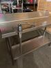 DESCRIPTION: 51" X 18" STAINLESS PREP TABLE W/ MOUNTED COMMERCIAL CAN OPENER ON CASTERS INFORMATION: 6" BACKSPLASH SIZE: 51" X 18" X 33" QTY: 1 - 9