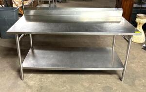 DESCRIPTION: 68" X 30" STAINLESS PREP TABLE W/ LOWER STORAGE SHELF AND 5" BACKSPLASH SIZE: 68" X 30" QTY: 1