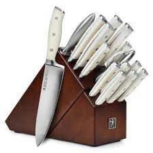 DESCRIPTION: (1) KNIFE SET BRAND/MODEL: HENCKELS INFORMATION: WHITE RETAIL$: $80.00 EA SIZE: 14 PC QTY: 1