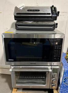 DESCRIPTION: MICROWAVE OVEN, TOASTER OVEN AND (2) ASSORTED VACUUM SEALERS INFORMATION: OUT OF BOX, WORKING CONDITION UNKNWON QTY: 1