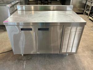 DESCRIPTION: DELFIELD 52" TWO DOOR WORK TOP FREEZER. BRAND / MODEL: DELFIELD F18WC52 ADDITIONAL INFORMATION SN# 1302150000060, 115 VOLT, 1 PHASE. POWE