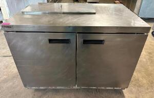 DESCRIPTION: DELFIELD 48" TWO DOOR WORK TOP COOLER BRAND / MODEL: DELFIELD 4448N-8-A4 ADDITIONAL INFORMATION 115 VOLT, 1 PHASE. POWERS ON AND WORKING