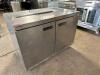 DESCRIPTION: DELFIELD 48" TWO DOOR WORK TOP COOLER BRAND / MODEL: DELFIELD 4448N-8-A4 ADDITIONAL INFORMATION 115 VOLT, 1 PHASE. POWERS ON AND WORKING - 2