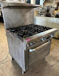 DESCRIPTION: SOUTHBEND SIX BURNER GAS RANGE W/ LOWER OVEN. BRAND / MODEL: SOUTHBEND 4361A ADDITIONAL INFORMATION W/ STAINLESS OVER SHELF. NATURAL GAS.