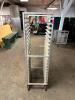 DESCRIPTION: TWENTY PAN FRONT LOAD TRAY RACK - ON CASTERS LOCATION: BAY 6 QTY: 1 - 2