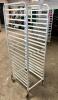 DESCRIPTION: TWENTY PAN FRONT LOAD TRAY RACK - ON CASTERS LOCATION: BAY 6 QTY: 1