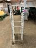 DESCRIPTION: TWENTY PAN FRONT LOAD TRAY RACK - ON CASTERS LOCATION: BAY 6 QTY: 1 - 2