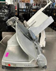 DESCRIPTION: HOBART COMMERCIAL DELI SLICER W/ GRINDER ATTACHMENT. BRAND / MODEL: HOBART LOCATION: BAY 6 QTY: 1