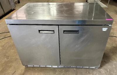 DESCRIPTION: DELFIELD 48" TWO DOOR WORK TOP COOLER BRAND / MODEL: DELFIELD UC4448N ADDITIONAL INFORMATION 115 VOLT, 1 PHASE. POWERS ON AND WORKING SIZ