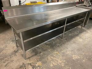 DESCRIPTION: 10' X 30" ALL STAINLESS TABLE W/ 6" BACK SPLASH AND UNDER COUNTER STORAGE. ADDITIONAL INFORMATION ALL STAINLESS SIZE 10' X 30" LOCATION: