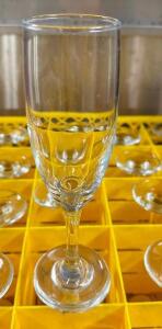 DESCRIPTION: (25) FLUTE GLASSES SOLD WITH GLASS RACK LOCATION: BAY 6 THIS LOT IS: SOLD BY THE PIECE QTY: 25