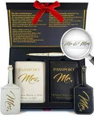 DESCRIPTION: (1) HONEYMOON LUGGAGE TAGS BRAND/MODEL: DELUXE RETAIL$: $30.00 EA QTY: 1